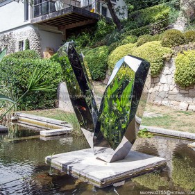 Outdoor stainless steel abstract geometric mirror sculpture  Outdoor stainless steel abstract geometric mirror sculpture