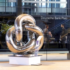 Entrusted sculpture, mirror polished stainless steel sculpture